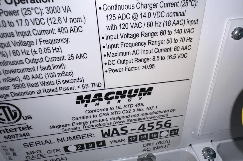  Yacht Photos Pics Label on Magnum charger detailing specifications and serial number for Albin North Sea Trawler, 1987.