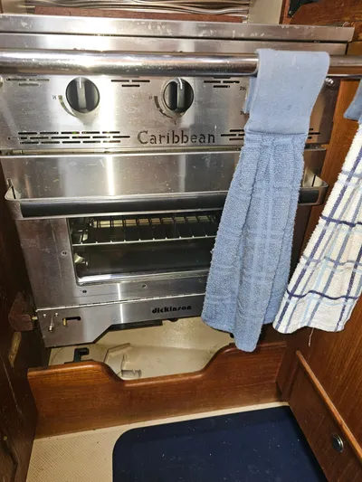 Moon River Yacht Photos Pics Stainless steel Caribbean oven in 2002 Island Packet 350 yacht kitchen.