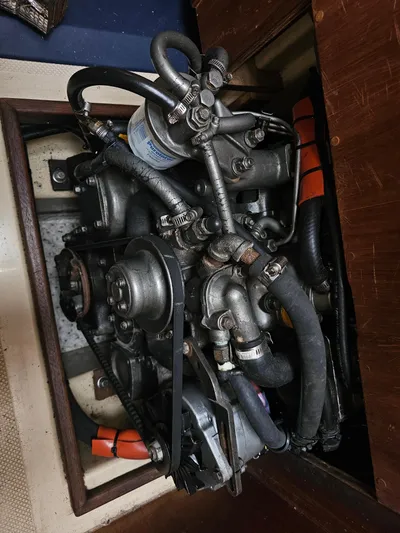 Moon River Yacht Photos Pics Engine compartment of a 2002 Island Packet 350 sailboat, showcasing mechanical components.