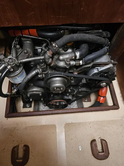 Moon River Yacht Photos Pics Engine compartment of a 2002 Island Packet 350 sailboat, showcasing mechanical components.