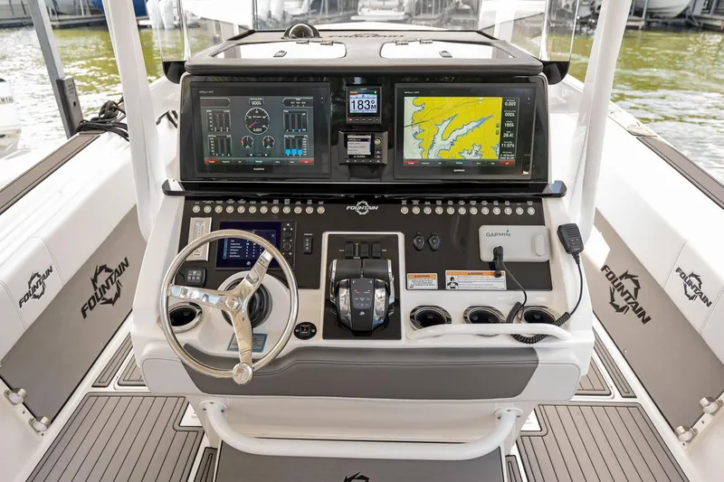  Yacht Photos Pics Cockpit of 2018 Fountain 38 SCX boat with advanced navigation and control systems.