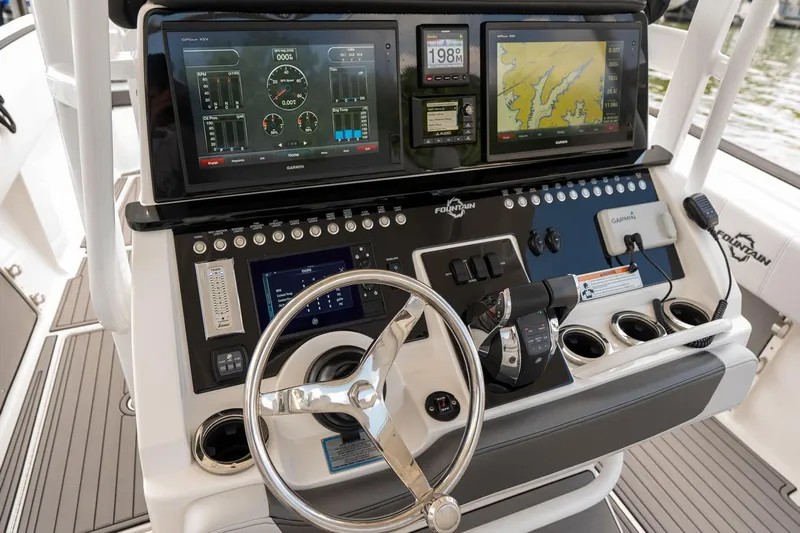  Yacht Photos Pics 2018 Fountain 38 SCX boat dashboard with advanced navigation and control systems.