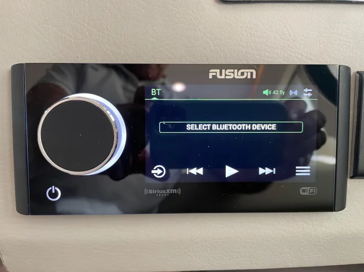 Grateful Yacht Photos Pics Fusion audio system display on 2022 Regal 42 FXO, showing Bluetooth device selection.