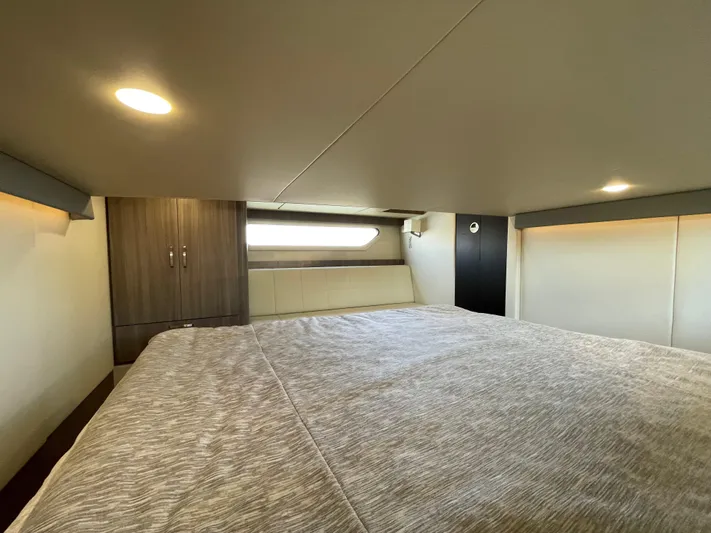 Grateful Yacht Photos Pics Luxurious cabin interior of 2022 Regal 42 FXO yacht with modern design.