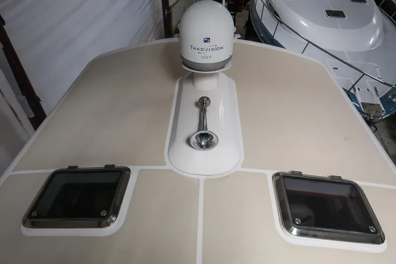 Blue Tang Yacht Photos Pics 2007 Grand Banks 39 Eastbay SX yacht deck with TracVision satellite dome.