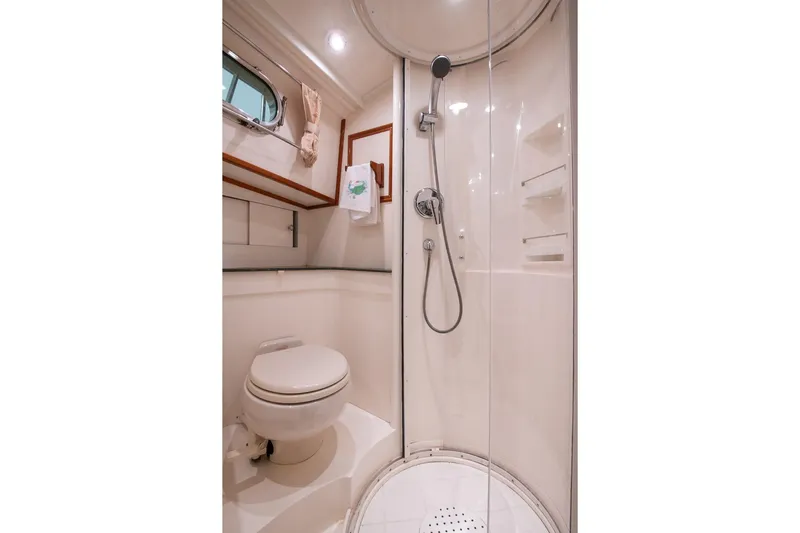 Blue Tang Yacht Photos Pics Bathroom of 2007 Grand Banks 39 Eastbay SX yacht with shower and toilet.