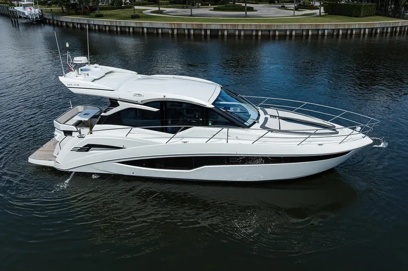  Yacht Photos Pics 2020 Galeon 425 HTS yacht cruising on calm water.