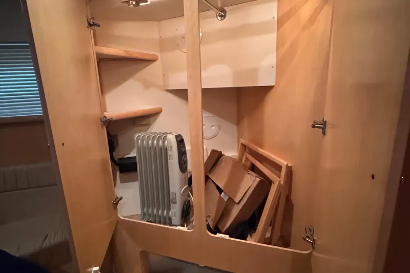  Yacht Photos Pics Interior storage of 1998 Carver 405 Aft Cabin with heater and shelves.