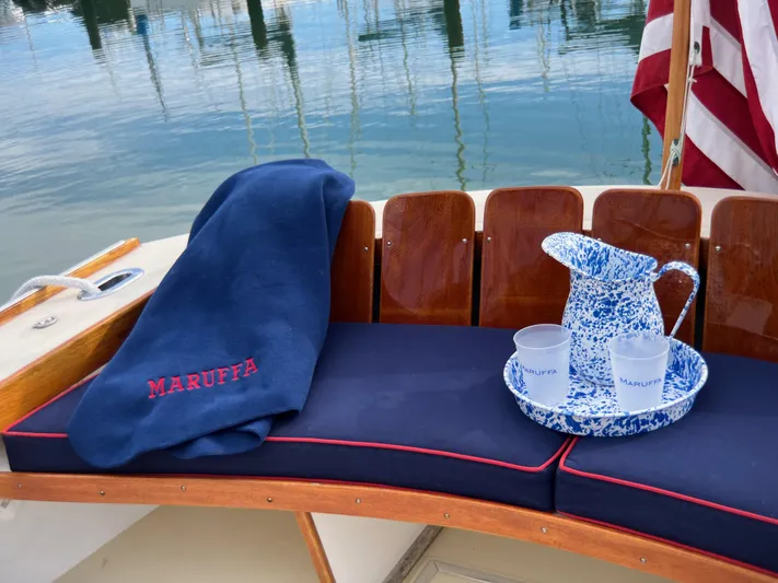 Maruffa Yacht Photos Pics Cozy seating on 1980 Dyer 29 boat with blanket and pitcher set.