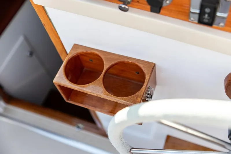 Maruffa Yacht Photos Pics Wooden cup holder on 1980 Dyer 29 boat interior.
