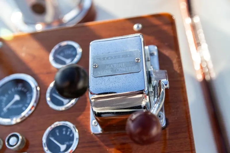 Maruffa Yacht Photos Pics Close-up of 1980 Dyer 29 marine engine control panel with gauges and levers.