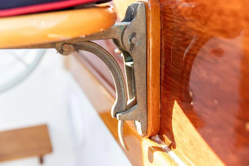 Maruffa Yacht Photos Pics Vintage 1980 Dyer 29 boat detail with brass hardware and polished wood finish.