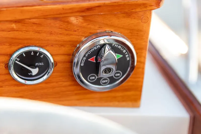 Maruffa Yacht Photos Pics Control panel of a 1980 Dyer 29 boat with fuel gauge and thruster switch.