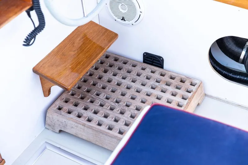 Maruffa Yacht Photos Pics Wooden step and grate in 1980 Dyer 29 boat interior.