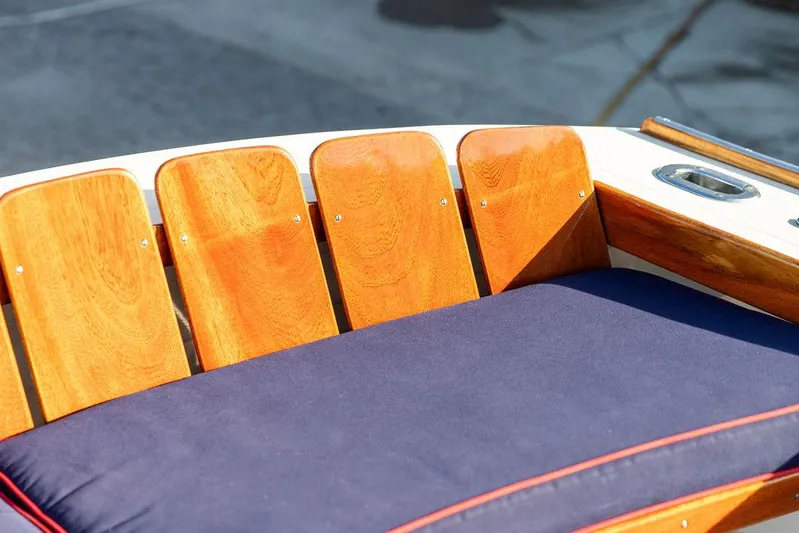 Maruffa Yacht Photos Pics Wooden seating on a 1980 Dyer 29 boat with blue cushion.