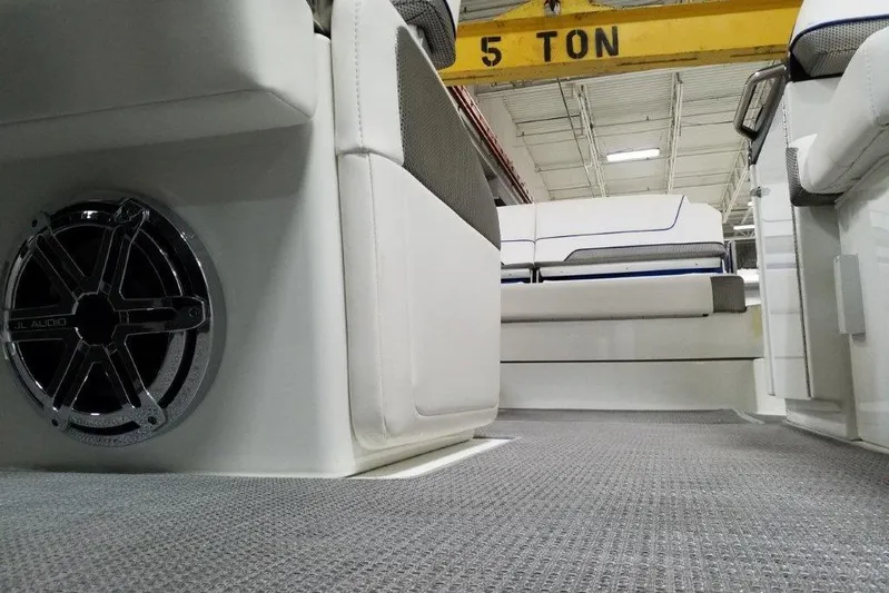  Yacht Photos Pics 2019 Formula 310 Sun Sport interior with JL Audio speaker and cushioned seating.