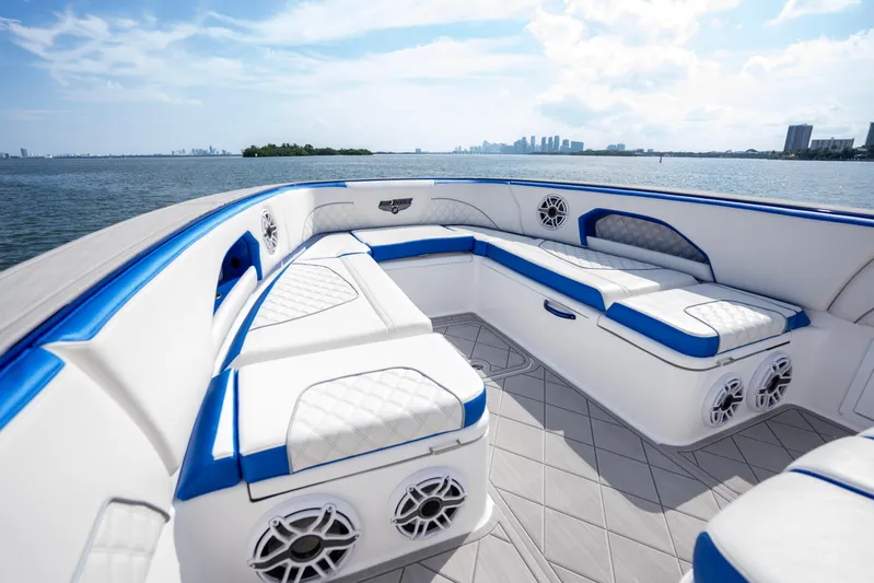  Yacht Photos Pics Luxurious seating on 2024 Deep Impact 399 Sport boat with ocean view.