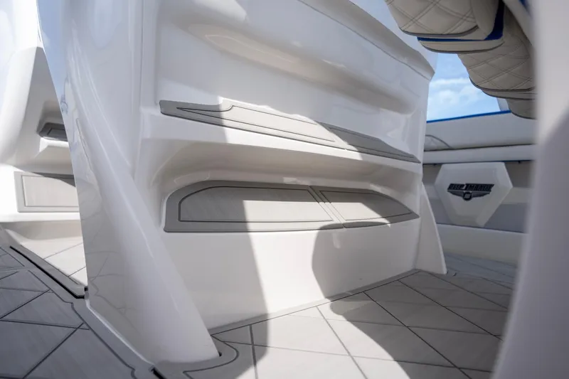  Yacht Photos Pics 2024 Deep Impact 399 Sport boat interior with sleek, modern design and spacious seating.