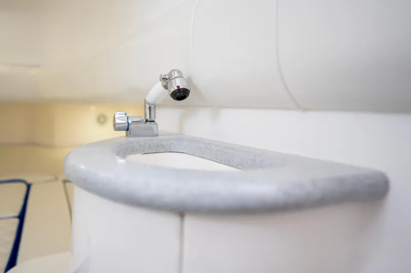  Yacht Photos Pics Modern sink and faucet in 2024 Deep Impact 399 Sport boat interior.