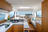 Luxurious interior of 2026 Solaris Power 60 yacht with modern design and ocean view.