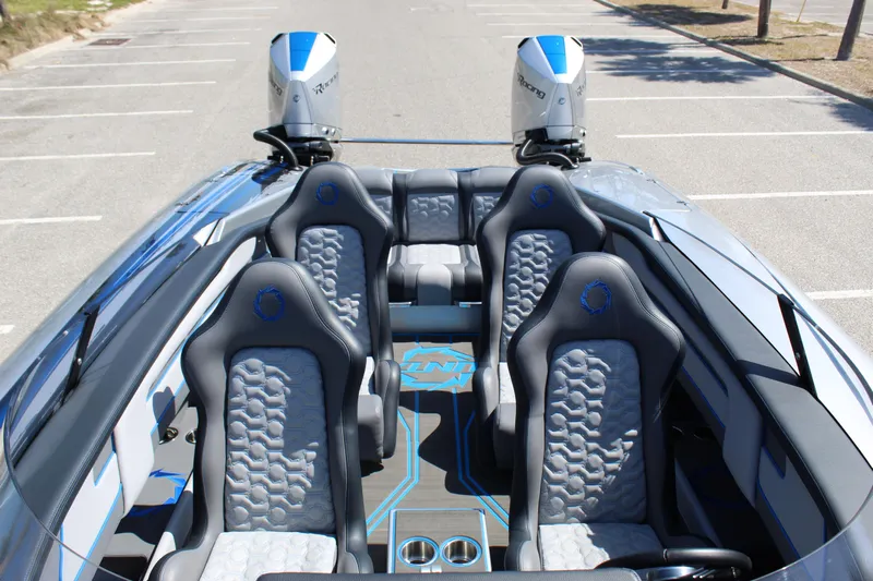  Yacht Photos Pics 2025 Fountain 34 Thundercat boat interior with sleek seating and dual engines.