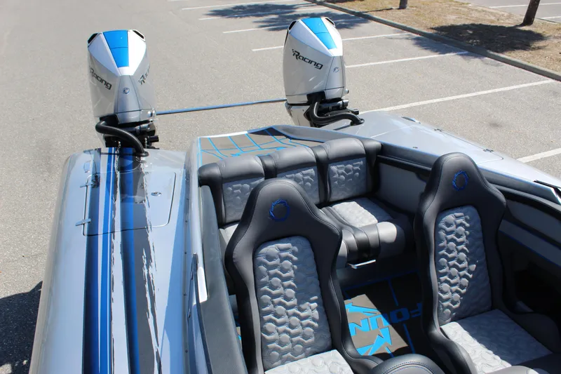  Yacht Photos Pics 2025 Fountain 34 Thundercat boat interior with dual engines and stylish seating.