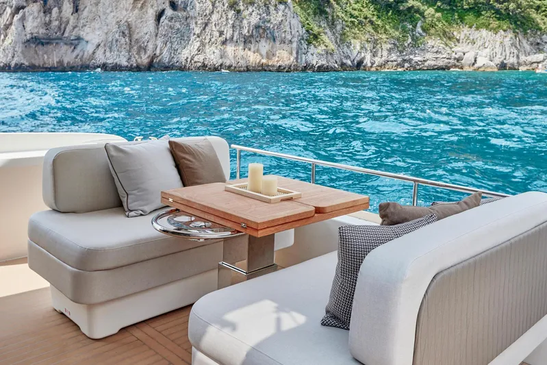  Yacht Photos Pics Luxury yacht deck with elegant seating, Prestige F 4.9, 2025 model, ocean view.