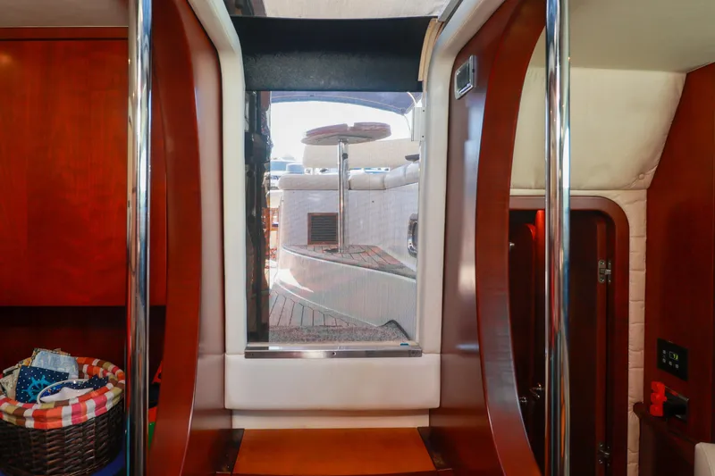 Aphrodite Yacht Photos Pics Interior view of 2004 Chris-Craft Roamer 40 yacht, featuring polished wood and modern design.