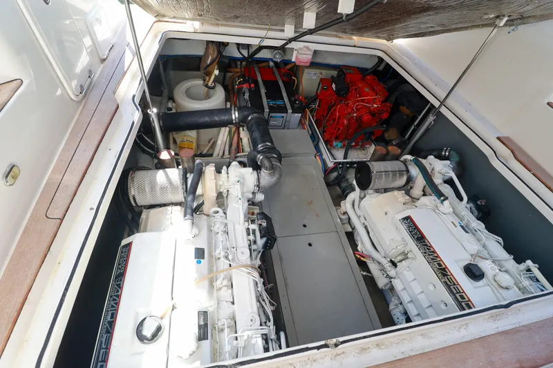 Aphrodite Yacht Photos Pics Engine room of 2004 Chris-Craft Roamer 40 yacht, showcasing dual engines and components.