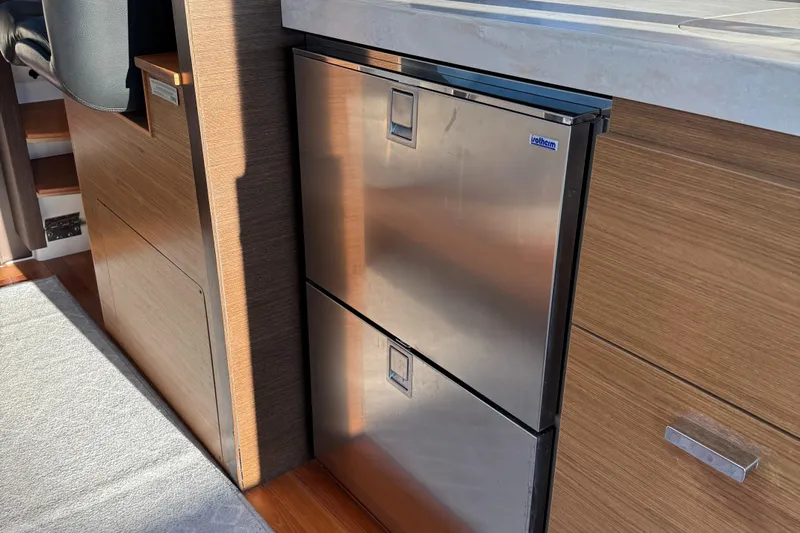 After Glow Yacht Photos Pics Stainless steel fridge in 2016 Tiara Yachts 39 Coupe interior.