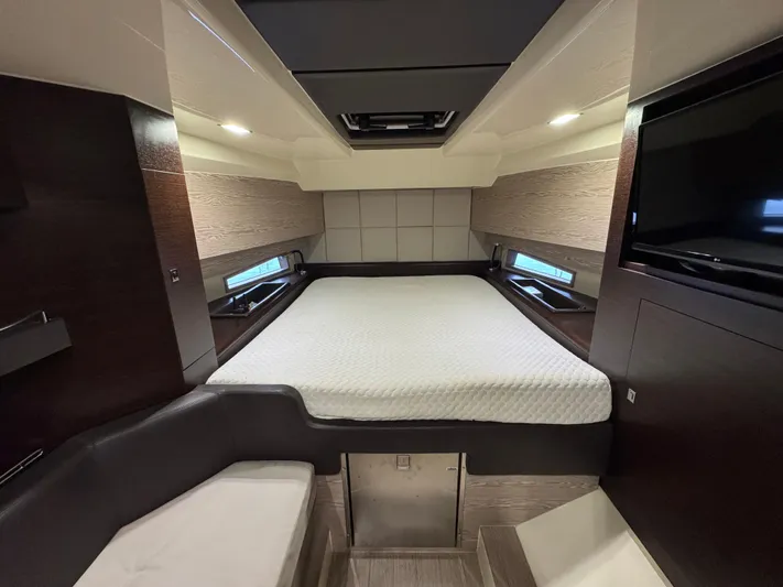 Anahita Yacht Photos Pics Luxurious cabin interior of 2017 SACS Rebel 47 yacht with modern bedding and ambient lighting.