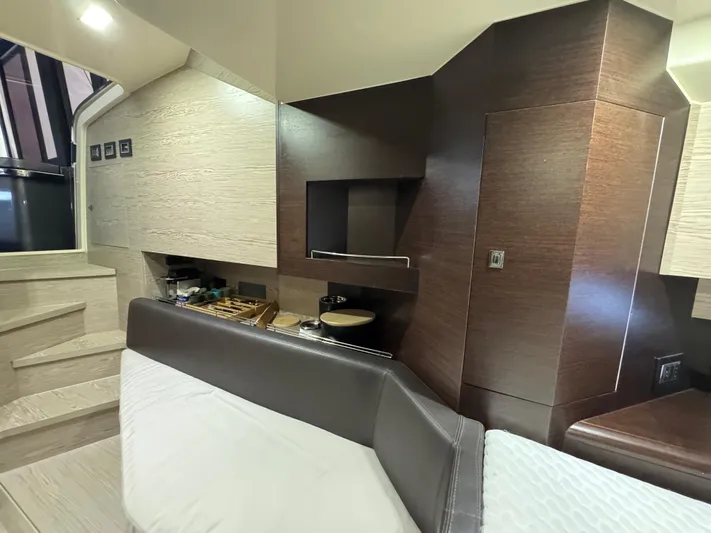 Anahita Yacht Photos Pics Luxurious interior of 2017 SACS Rebel 47 yacht with modern design and comfortable seating.