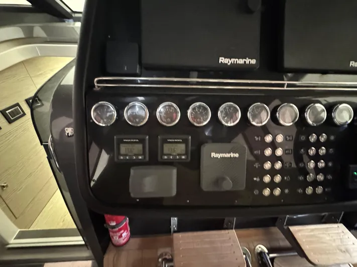 Anahita Yacht Photos Pics Control panel of 2017 SACS Rebel 47 boat with Raymarine navigation equipment.