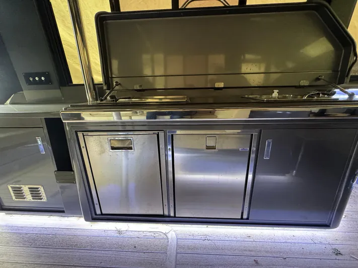 Anahita Yacht Photos Pics Stainless steel kitchen area on 2017 SACS Rebel 47 yacht.