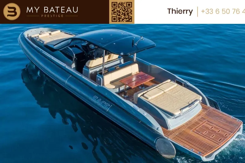 Anahita Yacht Photos Pics Luxury 2017 SACS Rebel 47 yacht on calm blue water, featuring elegant seating and deck.