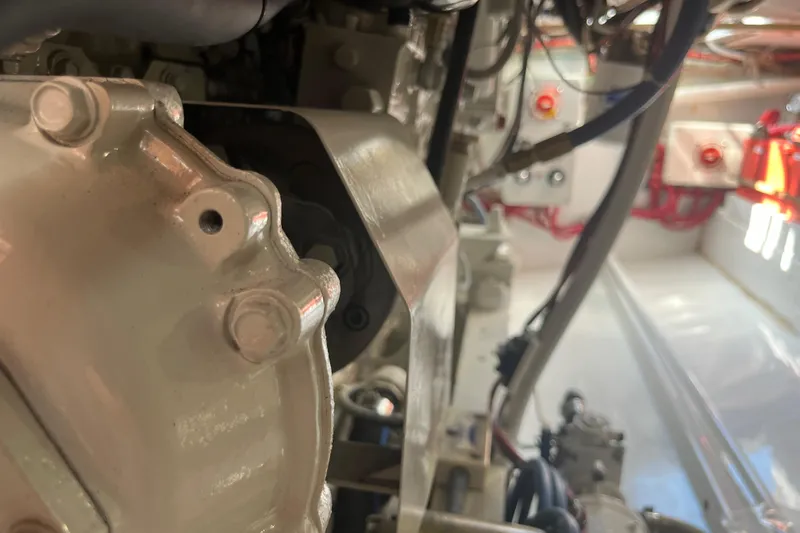 Charmer Yacht Photos Pics 1985 Rybovich Walkaround engine compartment with visible mechanical components.