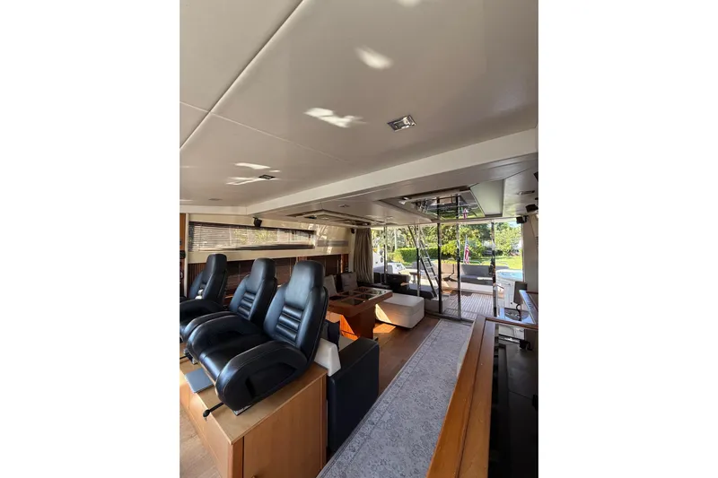 Jimbo Yacht Photos Pics Interior of 2012 Sunseeker Predator Sport Yacht 74 with luxurious seating and modern design.