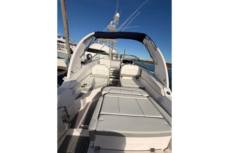  Yacht Photos Pics 2022 Regal 26 XO boat interior with sleek seating and modern design.