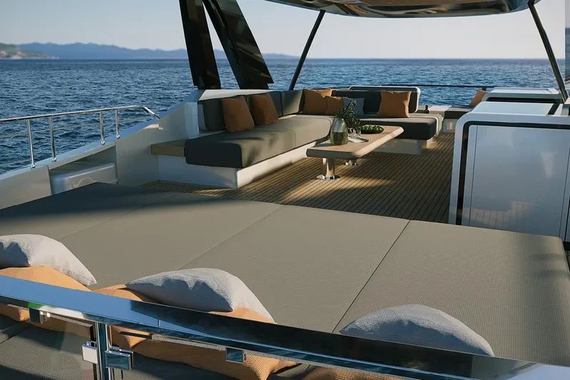  Yacht Photos Pics Luxurious deck of 2026 Solaris Power 70 Long Range yacht with elegant seating and ocean view.