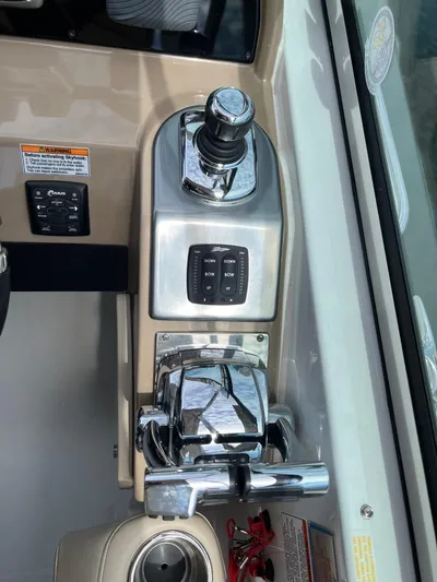 Last One III Yacht Photos Pics 2013 Formula 370 Super Sport boat control panel with joystick and throttle.