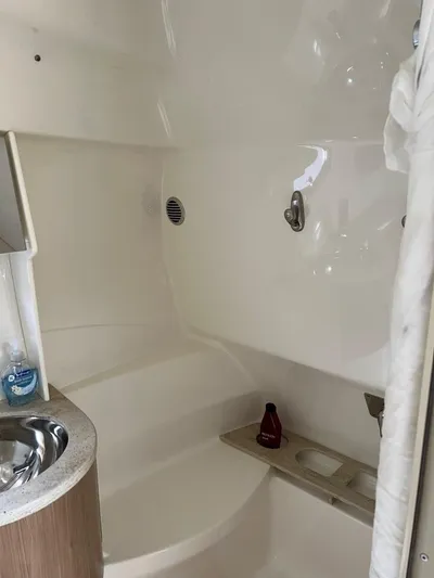 Last One III Yacht Photos Pics 2013 Formula 370 Super Sport boat bathroom with sink and shower.