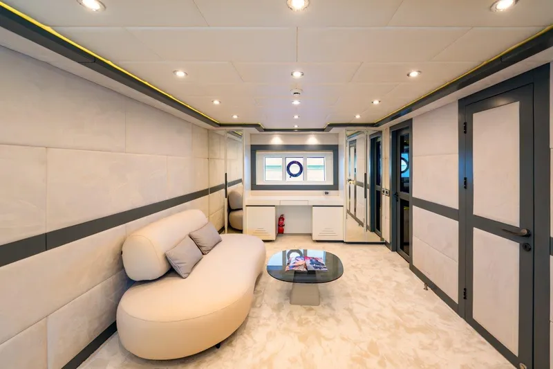 Yacht Photos Pics Luxurious interior of 2024 Custom Modern Trawler RPH with elegant seating and contemporary design.