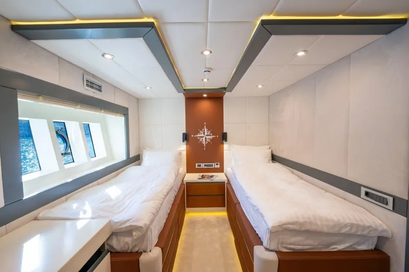  Yacht Photos Pics Luxurious twin cabin interior on 2024 Custom Modern Trawler RPH yacht.