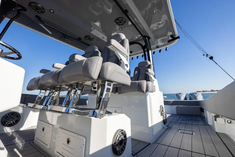 Jackie B Yacht Photos Pics 2024 Freeman 47 boat interior with sleek seating and modern design on open water.