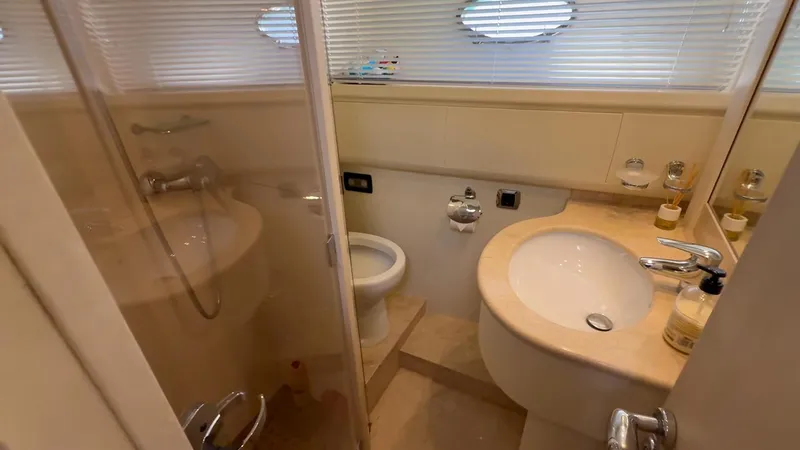  Yacht Photos Pics Luxurious bathroom in 2005 Astondoa 72 yacht, featuring modern fixtures and elegant design.