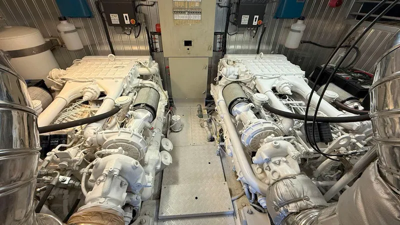  Yacht Photos Pics Engine room of a 2005 Astondoa 72 yacht, featuring dual powerful engines.