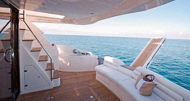  Yacht Photos Pics Luxurious 2007 Aicon 52 yacht deck with ocean view and elegant seating.