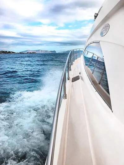  Yacht Photos Pics Aicon 52 yacht cruising on open sea, 2007 model, with scenic ocean view.