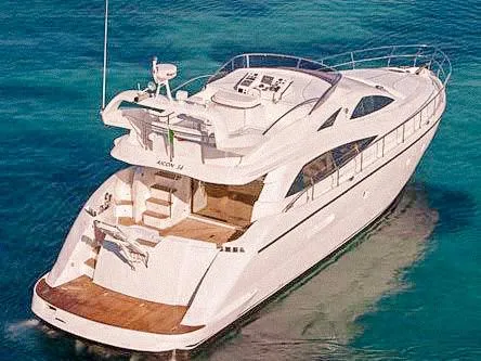  Yacht Photos Pics Luxurious 2007 Aicon 52 yacht cruising on clear blue waters.