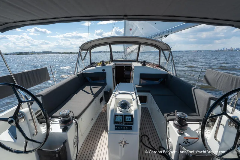 Boat Tox Yacht Photos Pics 2022 Jeanneau Sun Odyssey 440 sailboat interior with dual steering wheels on open water.
